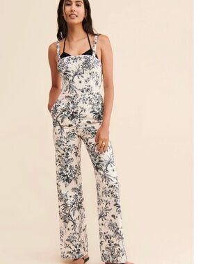 Anthropologie Cream and blue strappy Floral Jumpsuit